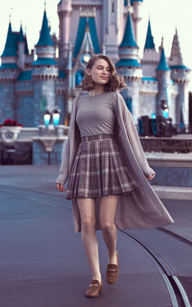 Layer a plaid skirt with a fitted tee and cardigan.