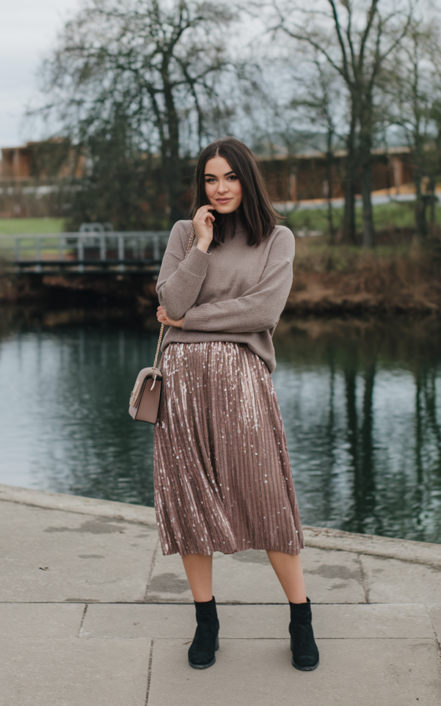 Style a sequin skirt with a simple knit and ankle boots.