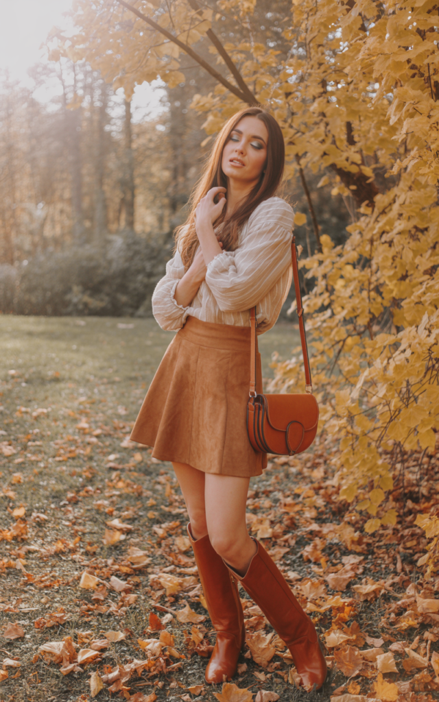 Style a suede mini skirt with a billowy blouse