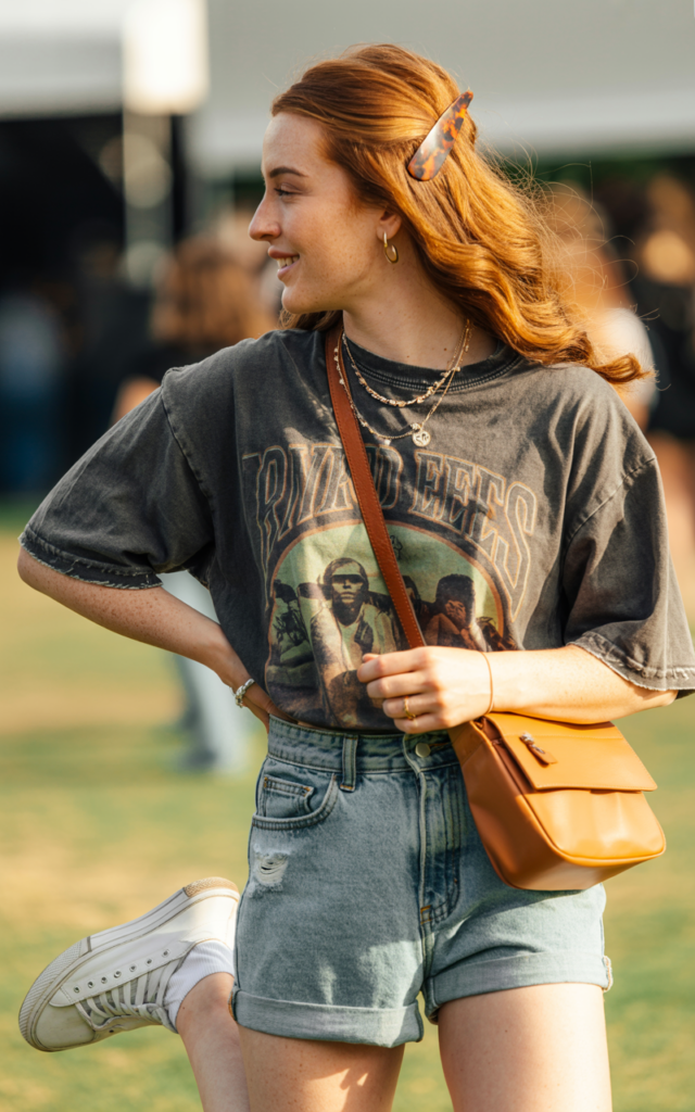 Pair distressed denim shorts with a breezy graphic tee.
