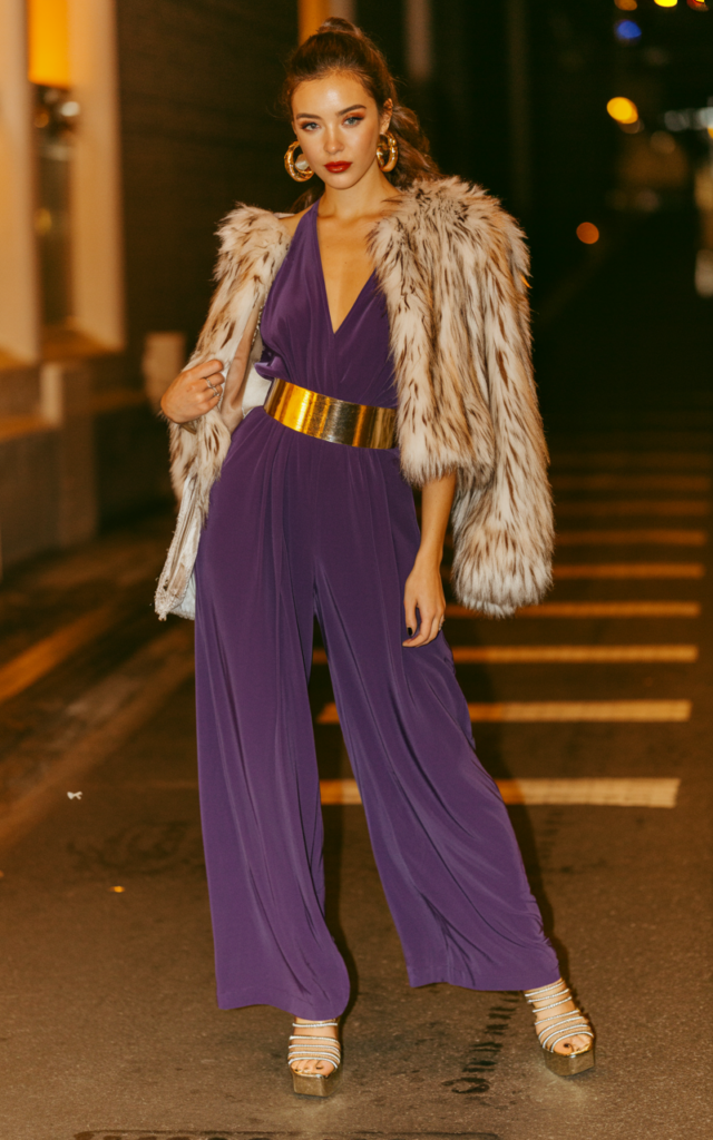 Step into a dramatic wide-leg jumpsuit in jewel tones.