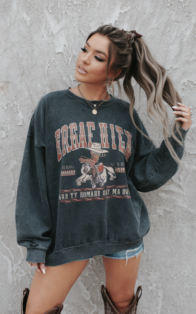 Style a Graphic Western Sweatshirt with Mini Shorts