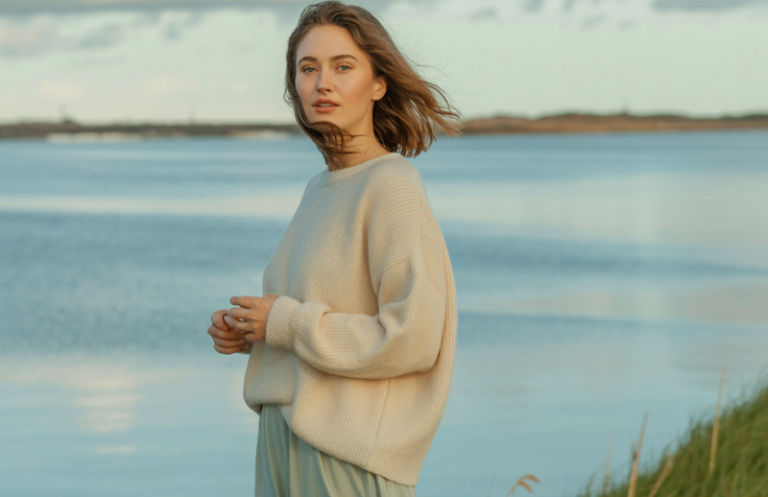 Style a midi skirt with a soft knit top