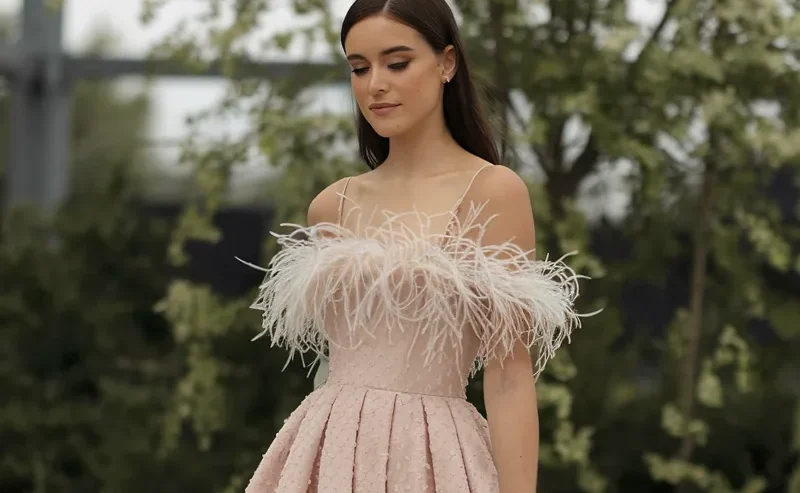 Try a feather-trimmed gown for a playful statement