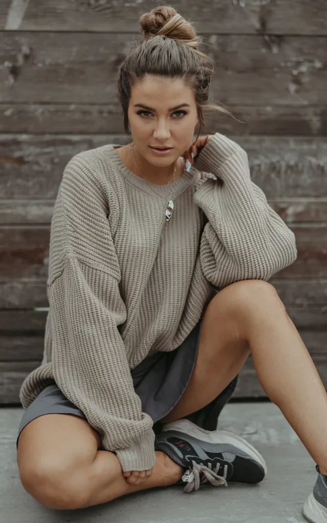 Style with an oversized sweater half-tucked
