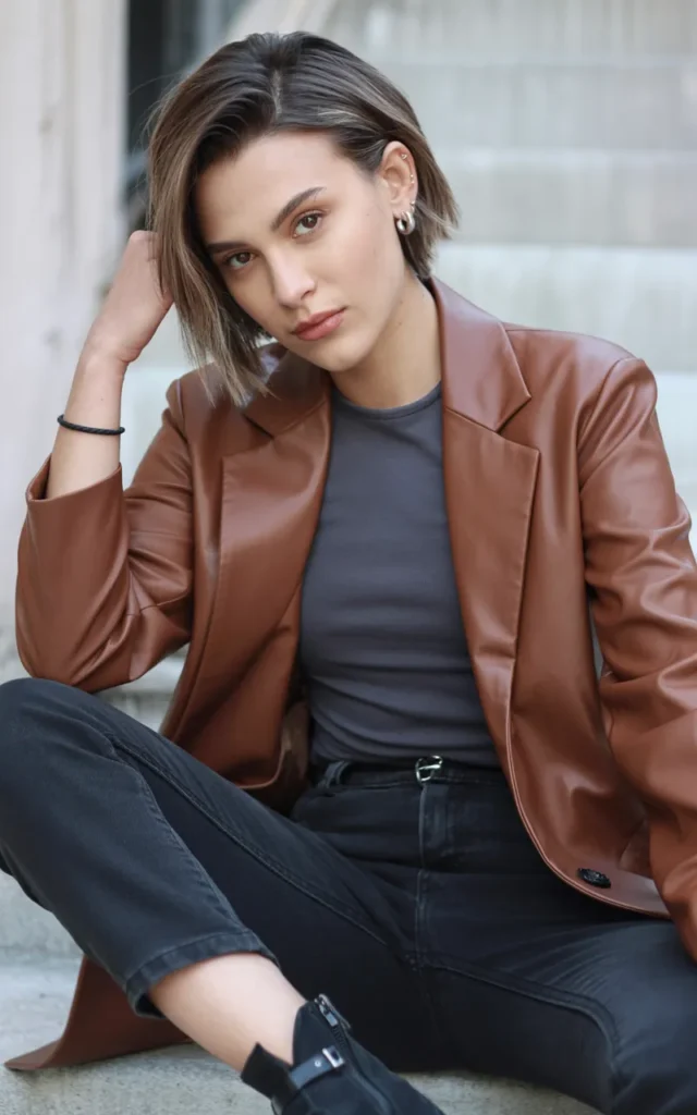 Pair a leather blazer with black jeans and boots