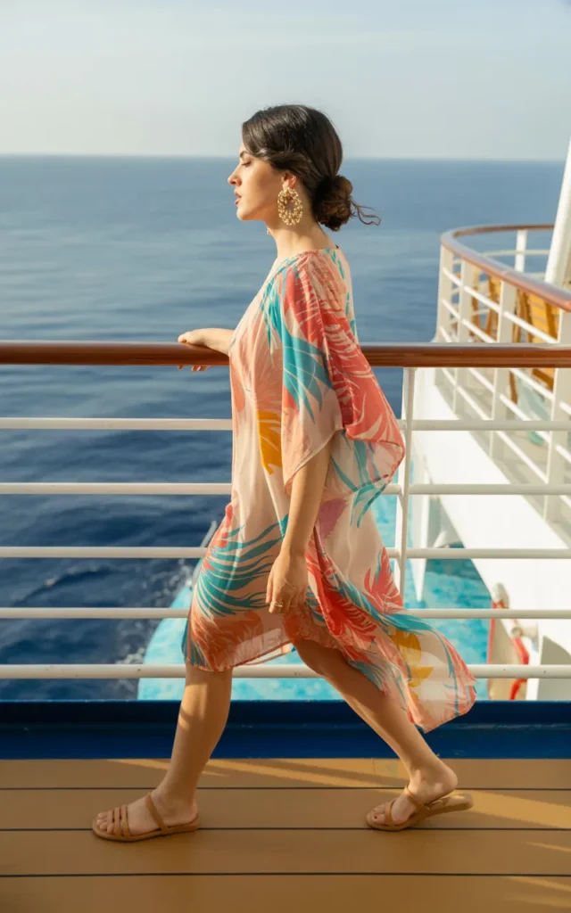 Throw on a breezy kaftan with statement earrings